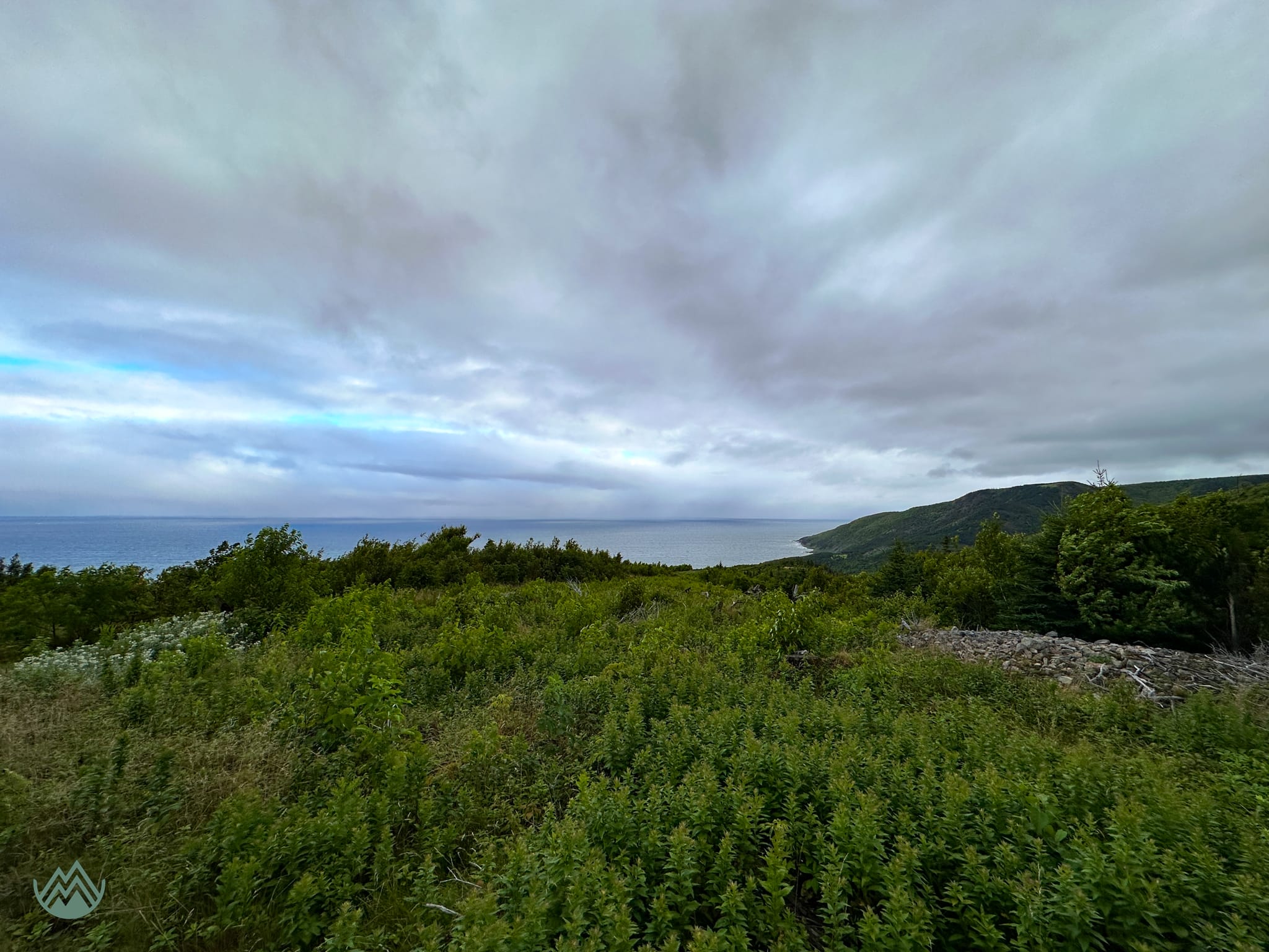 Capes 100 2023: First view of the ocean before descending to MacKinnon's Brook Bridge.